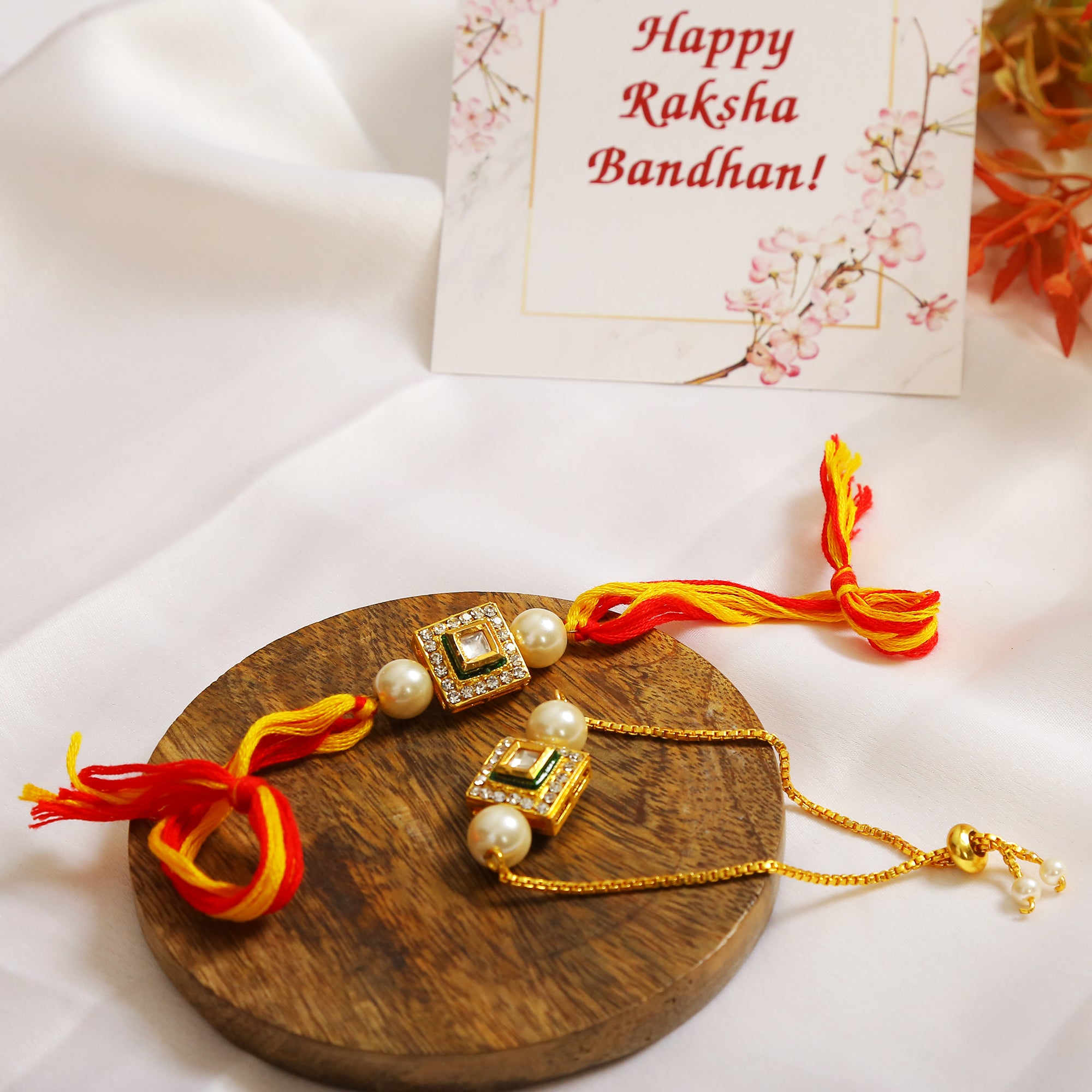 Handcrafted Studded Kundan Rakhi & Lumba Set- Set Of 2
