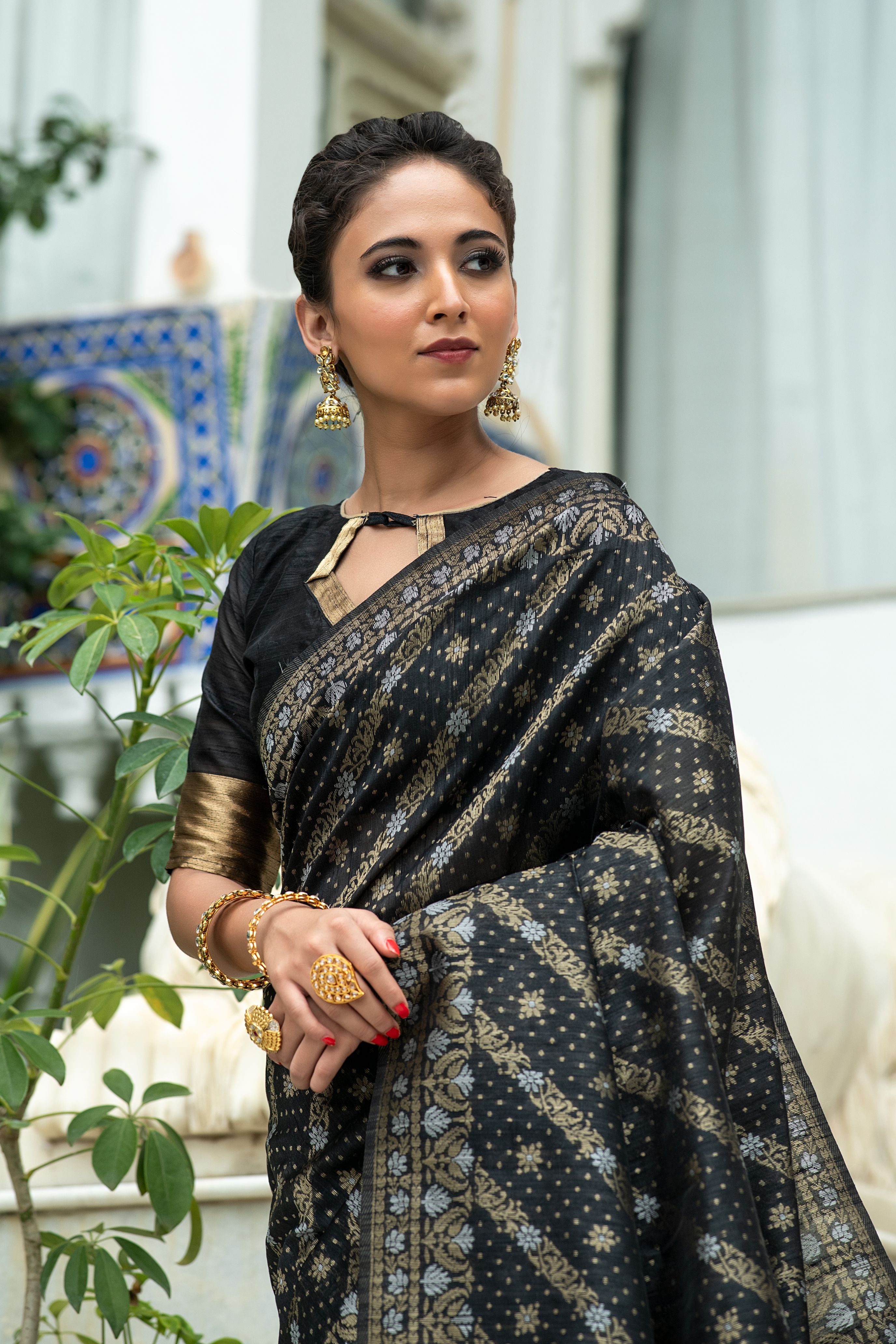 Women's Black Woven Tussar Silk Saree With Tassels