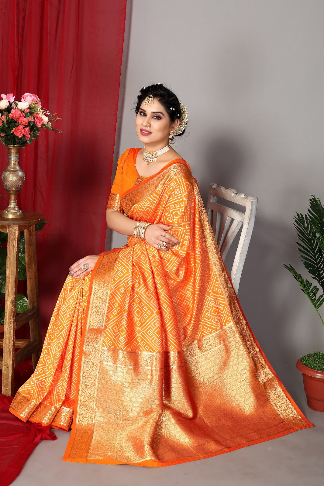 Women's Orange Designer Saree Collection
