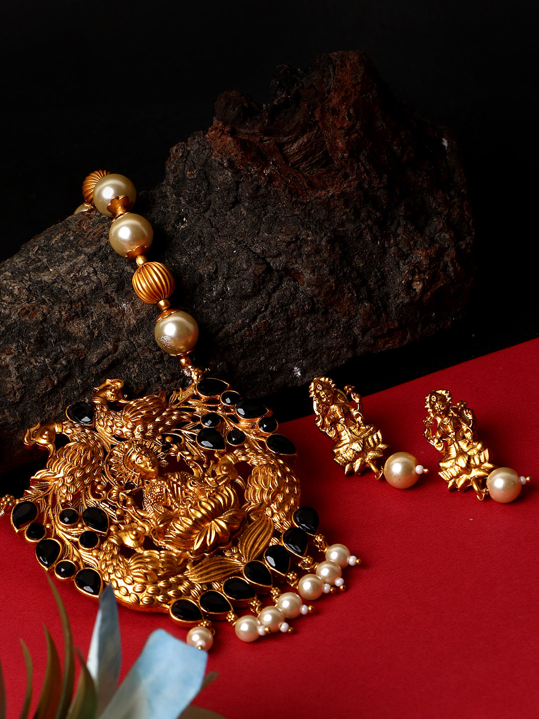 Women's Antique Matte Gold Finish Goddess Laxmi Black Stone Studded Temple Jewellery set