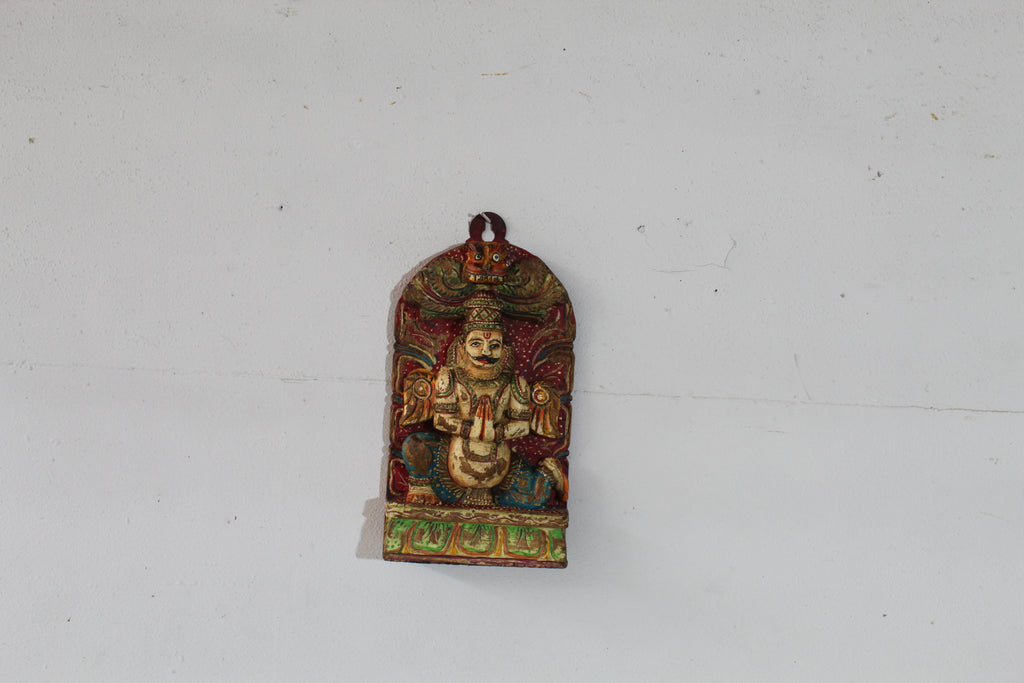 Small Hand-Carved Wooden Statue