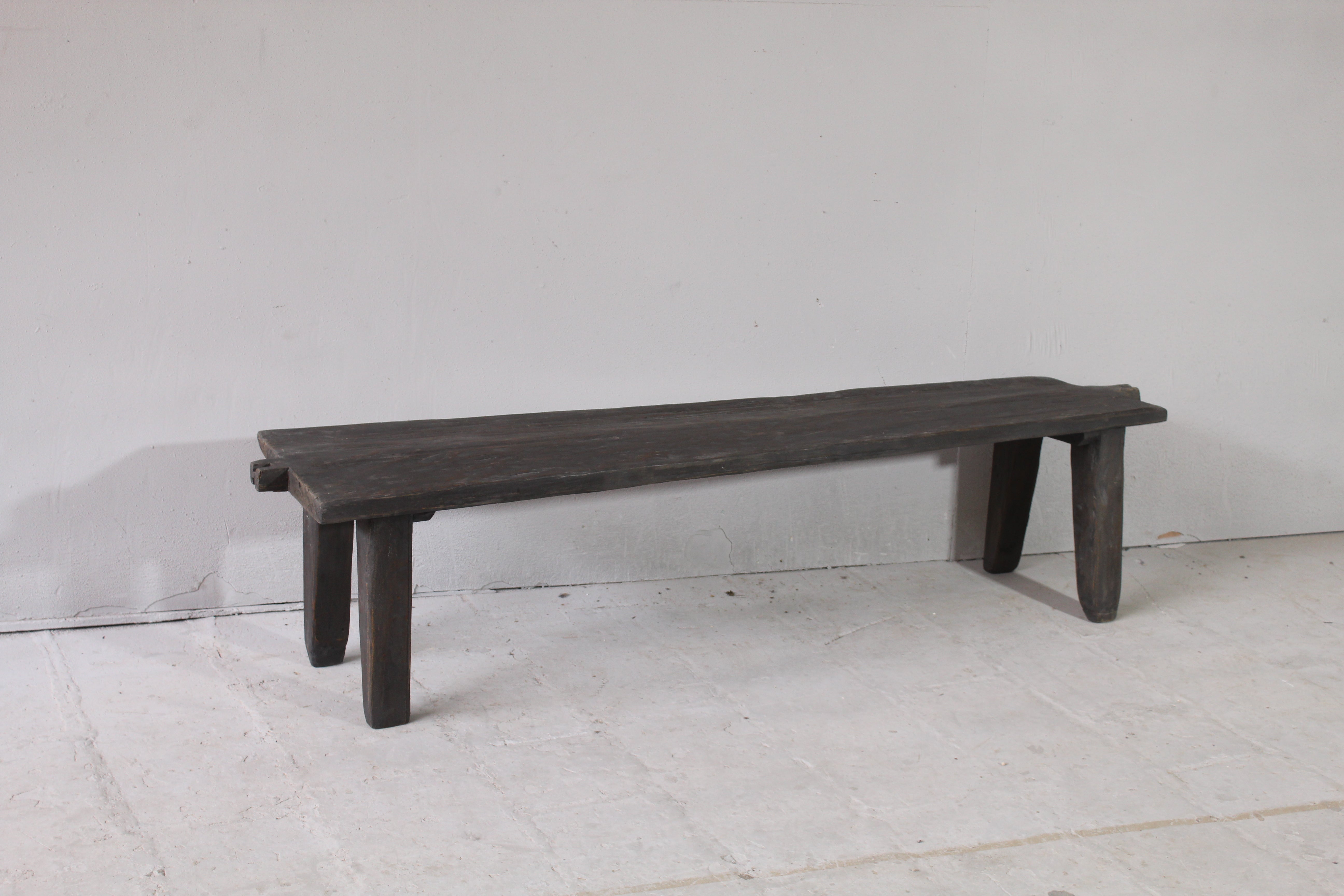 A Rustic Long Wooden Bench