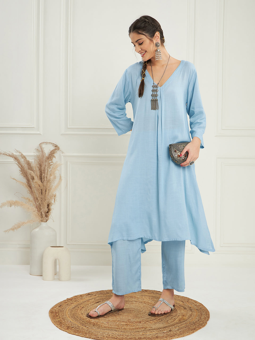 Women's Pastel Blue Solid V Neck Kurta Pant Set - InWeave