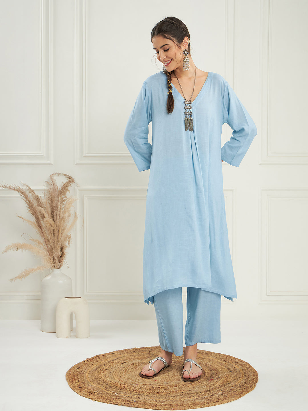 Women's Pastel Blue Solid V Neck Kurta Pant Set - InWeave