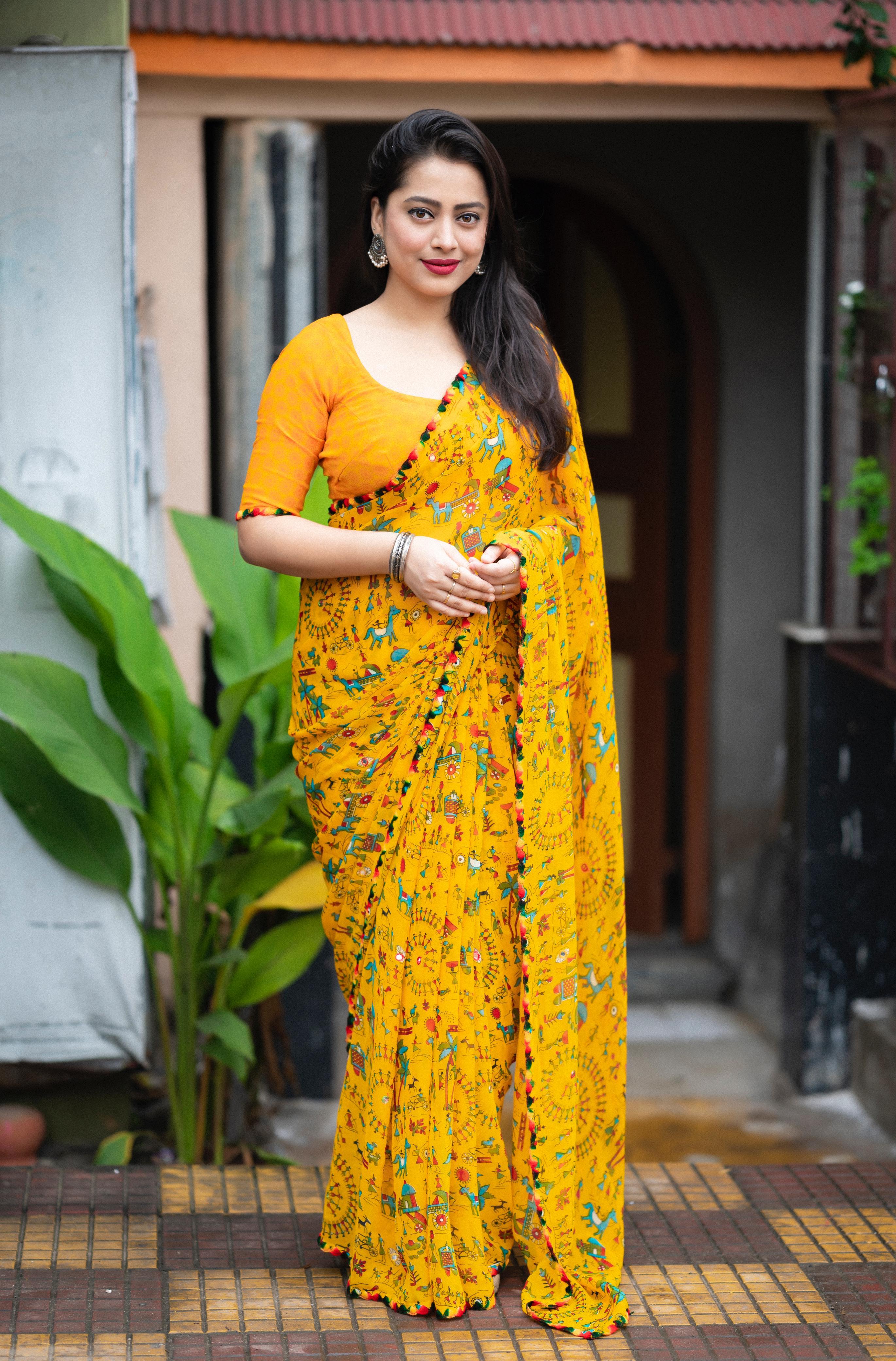 Women's Yellow Soft Georgette Saree With Blouse - A2M