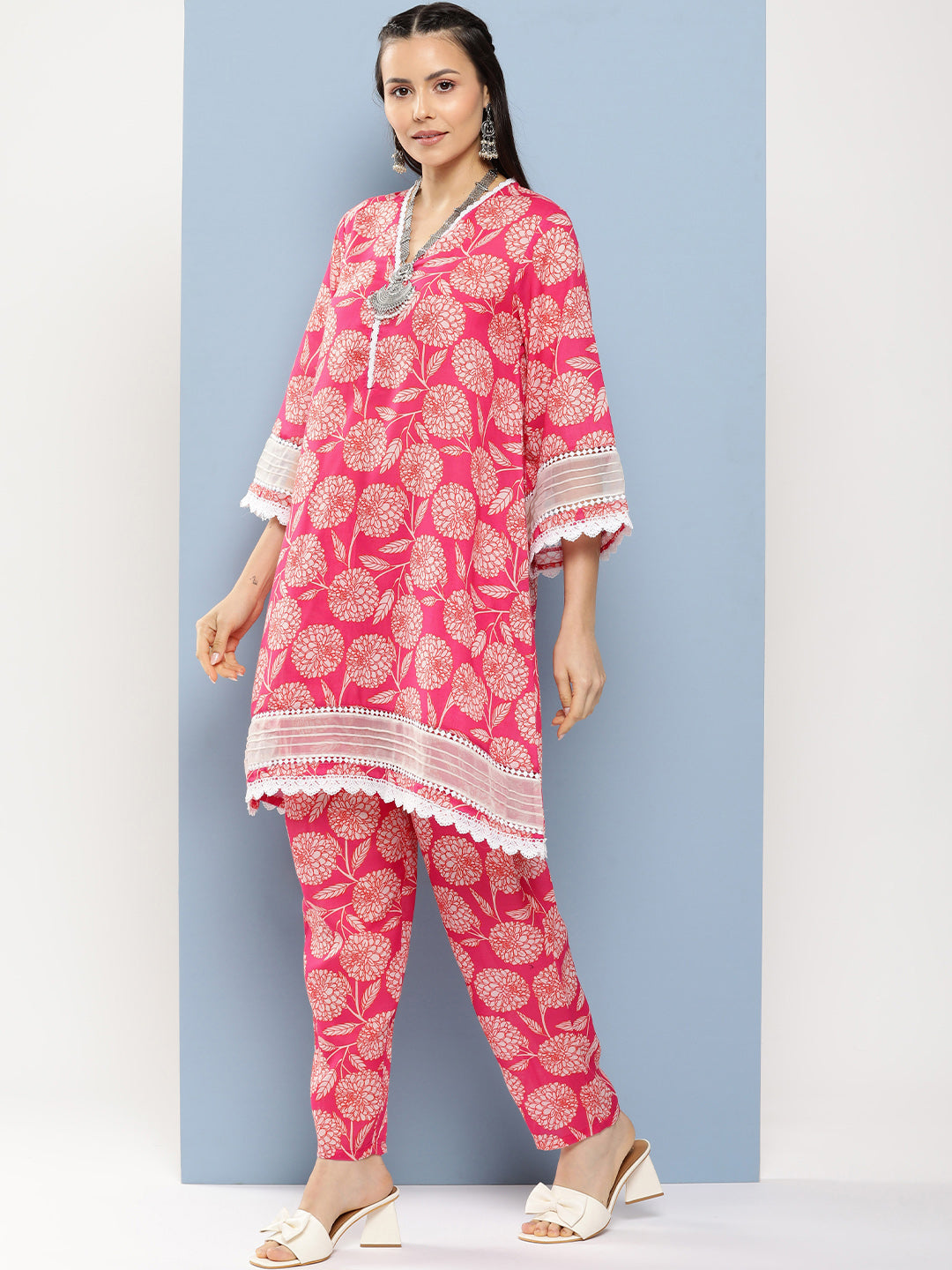 Women's Pink Floral Print A- Line Kurta With Lace Detailing & Pink Floral Print Trousers - Bhama Couture