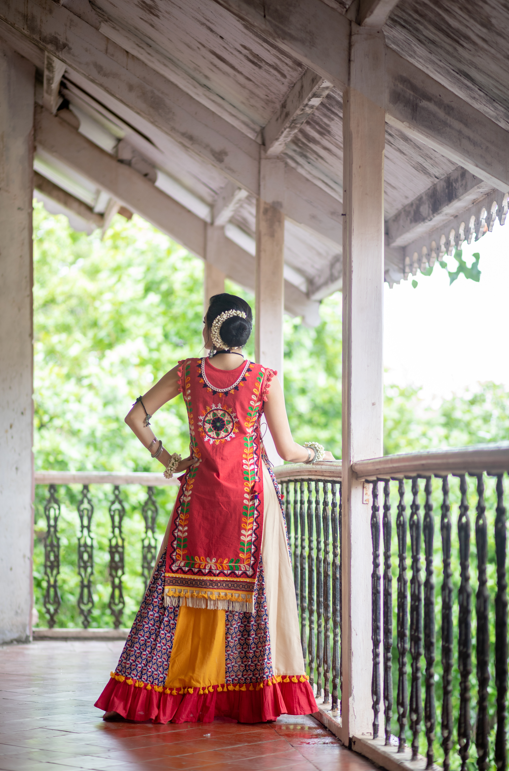 Women's Red Circular Treditional Embroidered Panel Top Paired With Multicolor Flairy Skirt