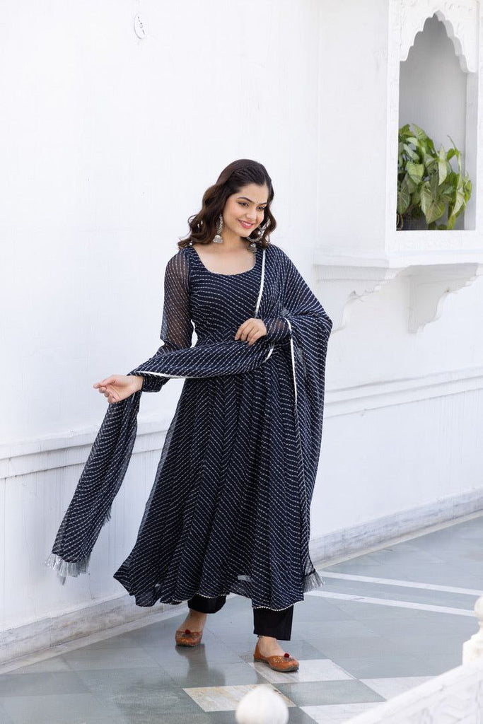 Women's Floral Printed Knee Length Elbow Length Sleeves Round Neck Kurti And Palazzo Set With Net Dupatta