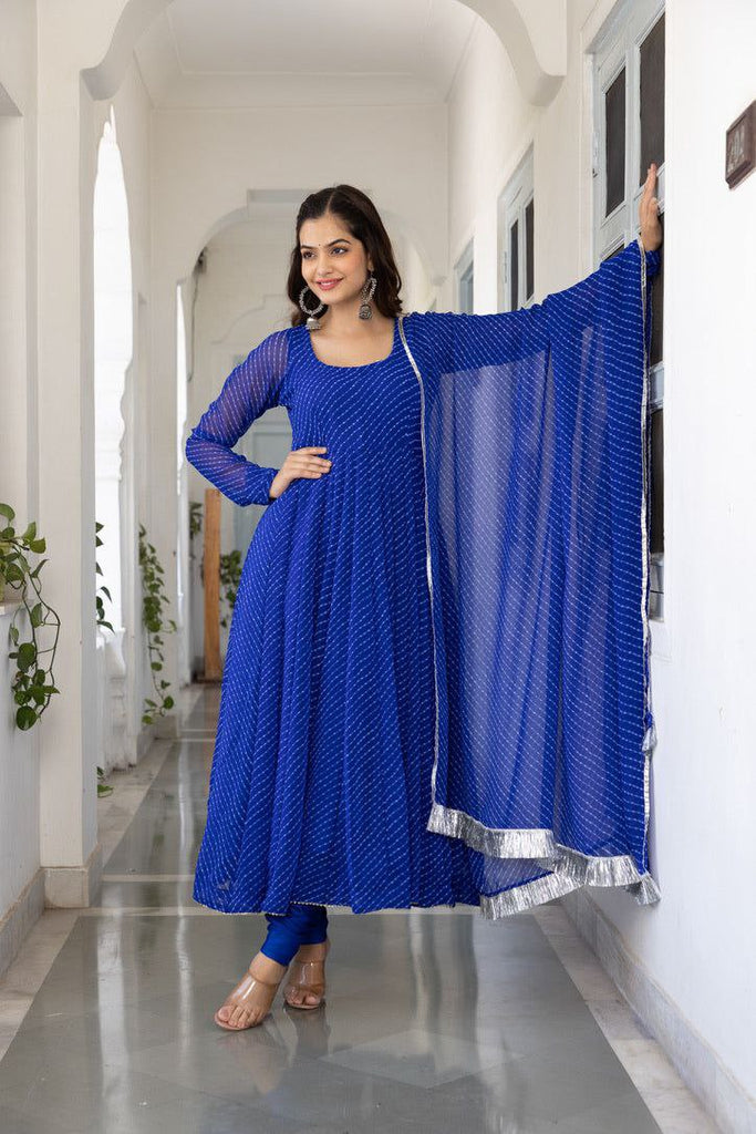 Women's Floral Printed Knee Length Elbow Length Sleeves Round Neck Kurti  With Net Dupatta