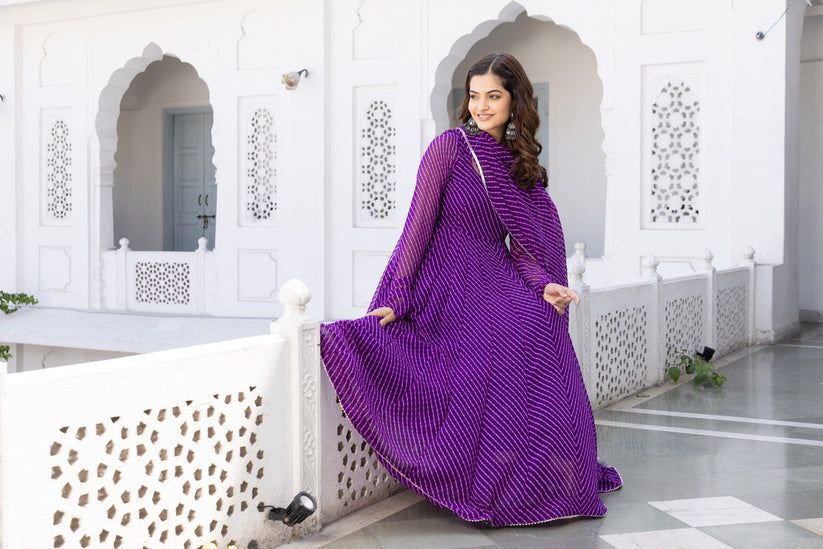 Women's Floral Printed Knee Length Elbow Length Sleeves Round Neck Kurti And Palazzo Set With Net Dupatta