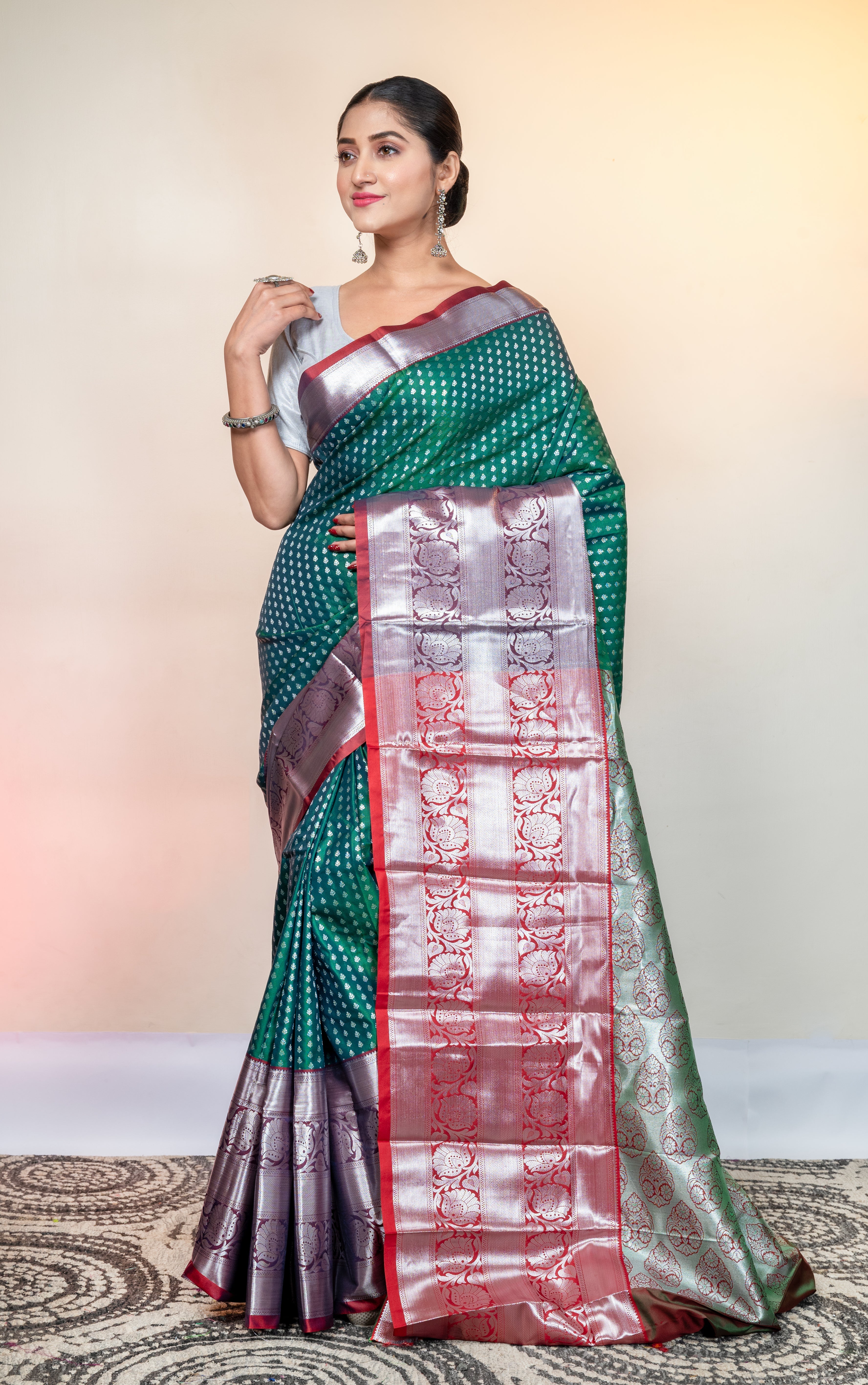 Women's Pure Kanjivaram Saree In Green Color With Silver Zari Woven Motifs And Border - Aanika