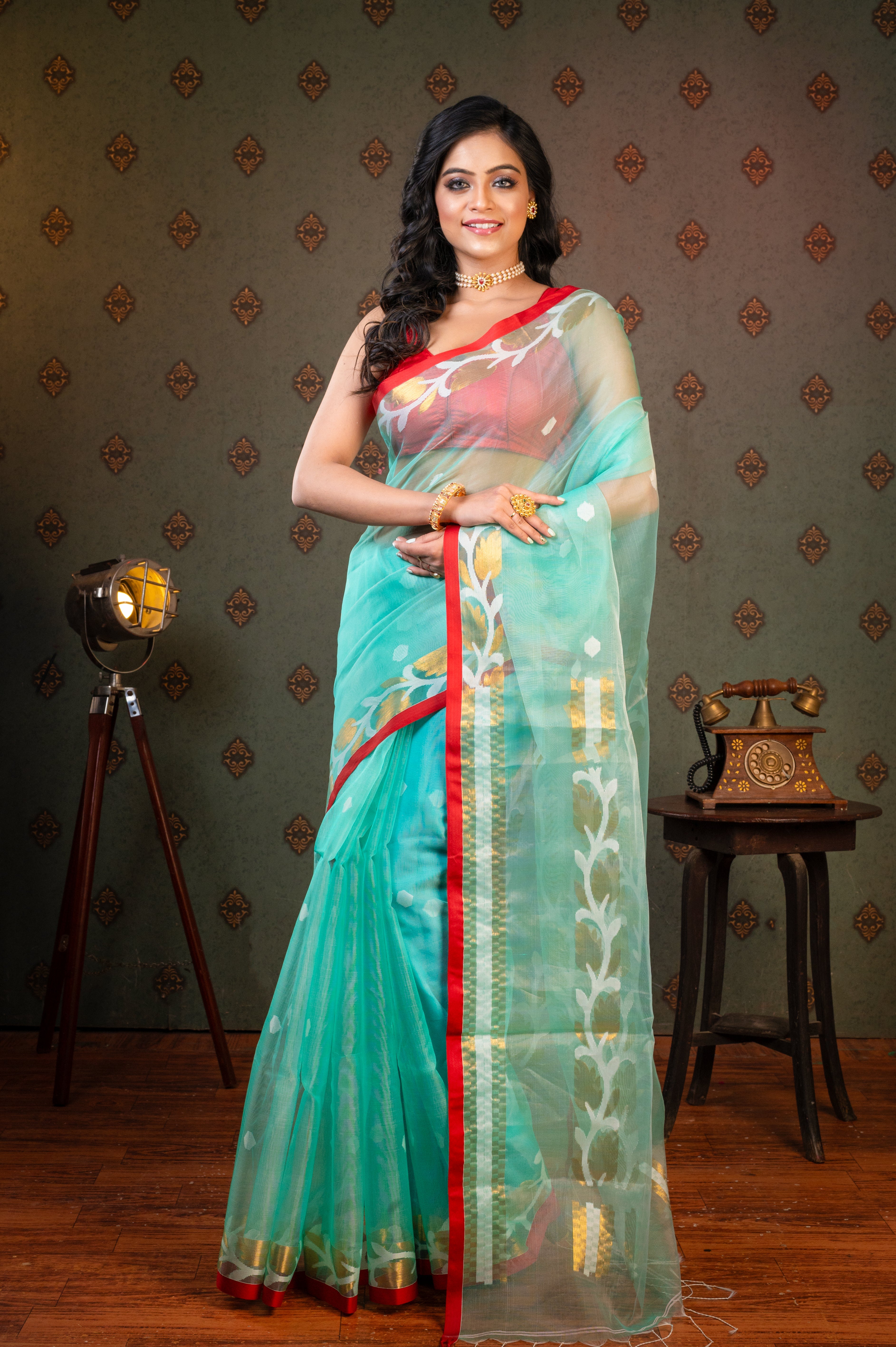 Women's Sea Green Pure Muslin Silk Saree With Red Border And Floral Motifs - Aanika