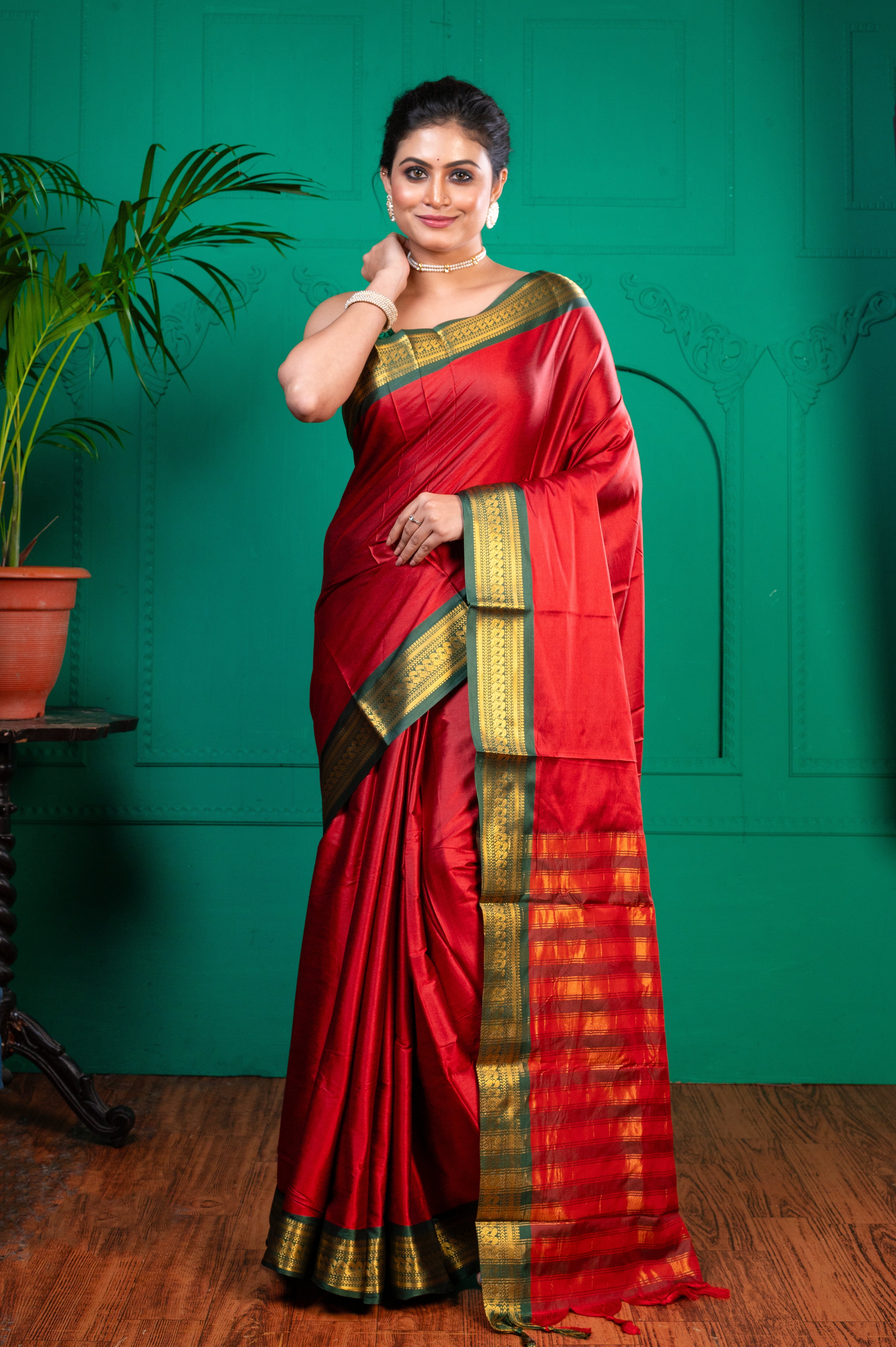 Women's Red Aura Silk Saree With Contrasting Green And Golden Zari Border - Aanika