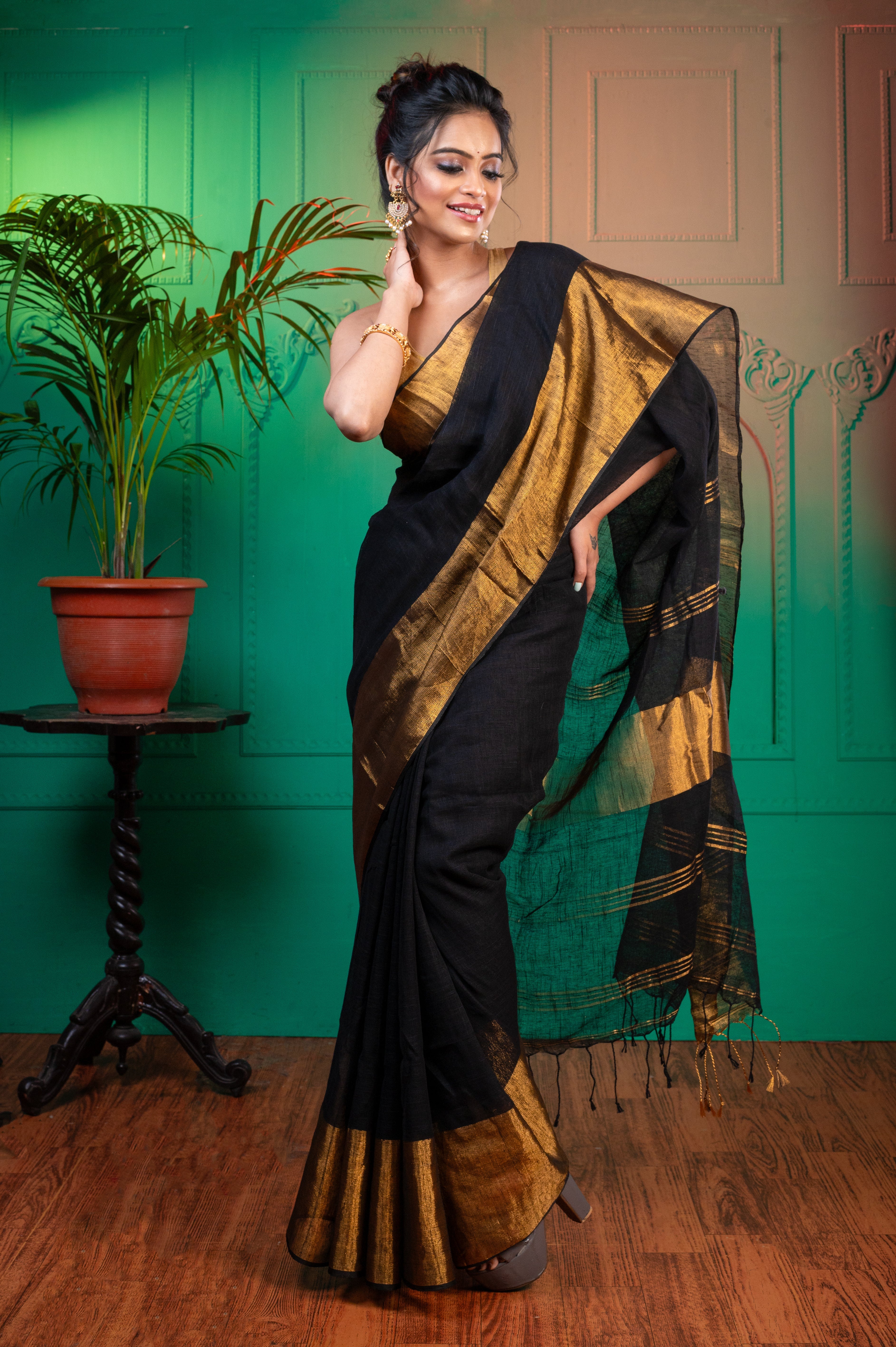 Women's Black Pure Handloom Linen Saree With Golden Zari  Border And Pallu - Aanika