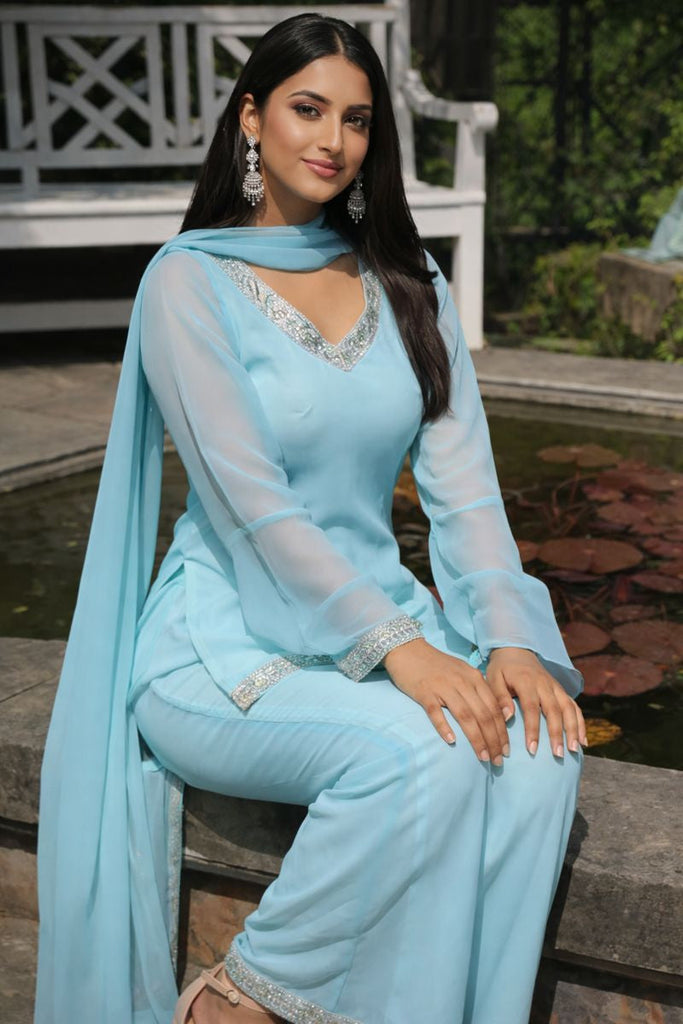 Women's Blue Embellished Kurta with Flared Palazzo Set