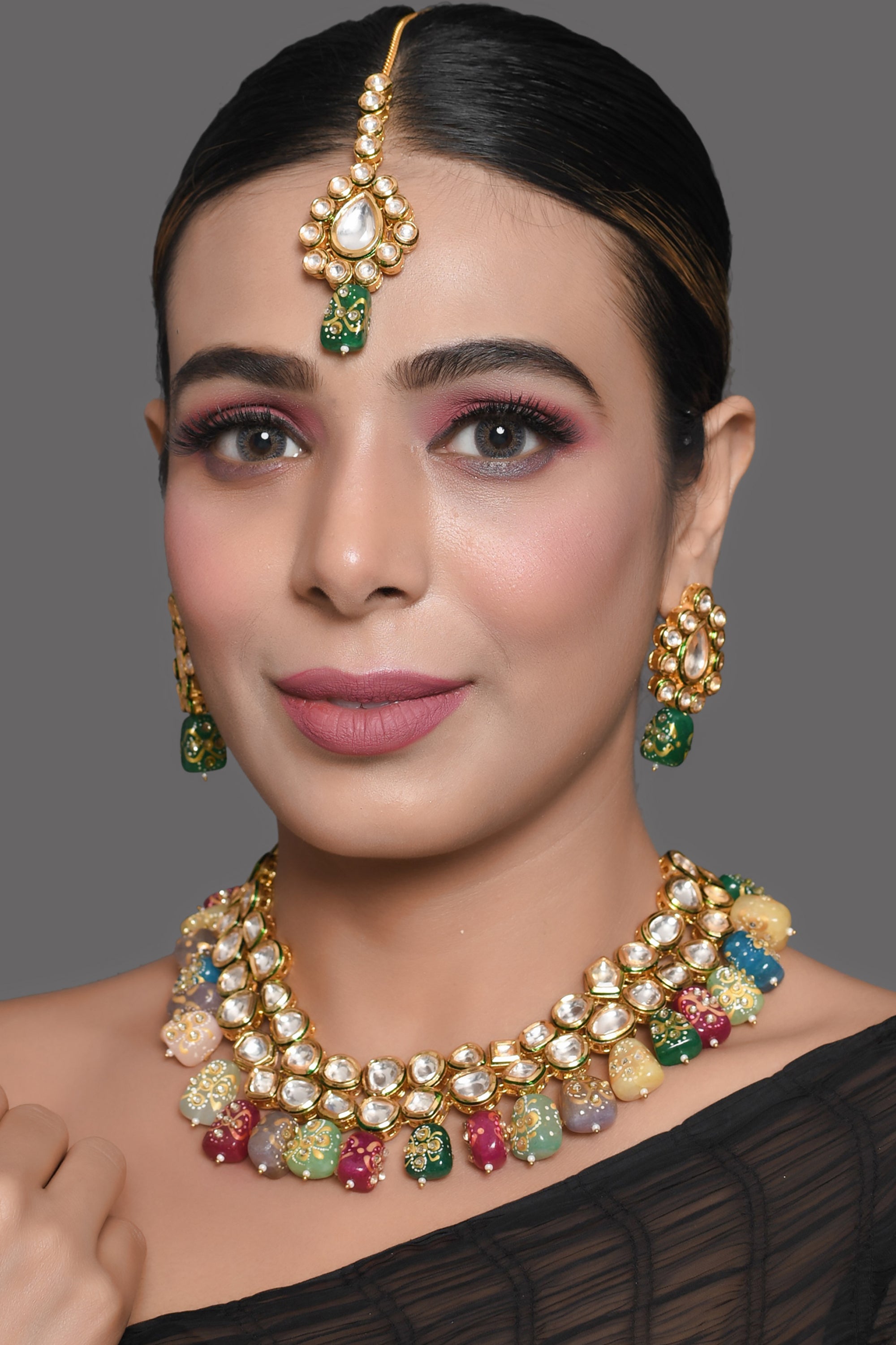 Women's Gold toned multicolored beaded kundan necklace teamed with matching earrings & mang tika - Femizen
