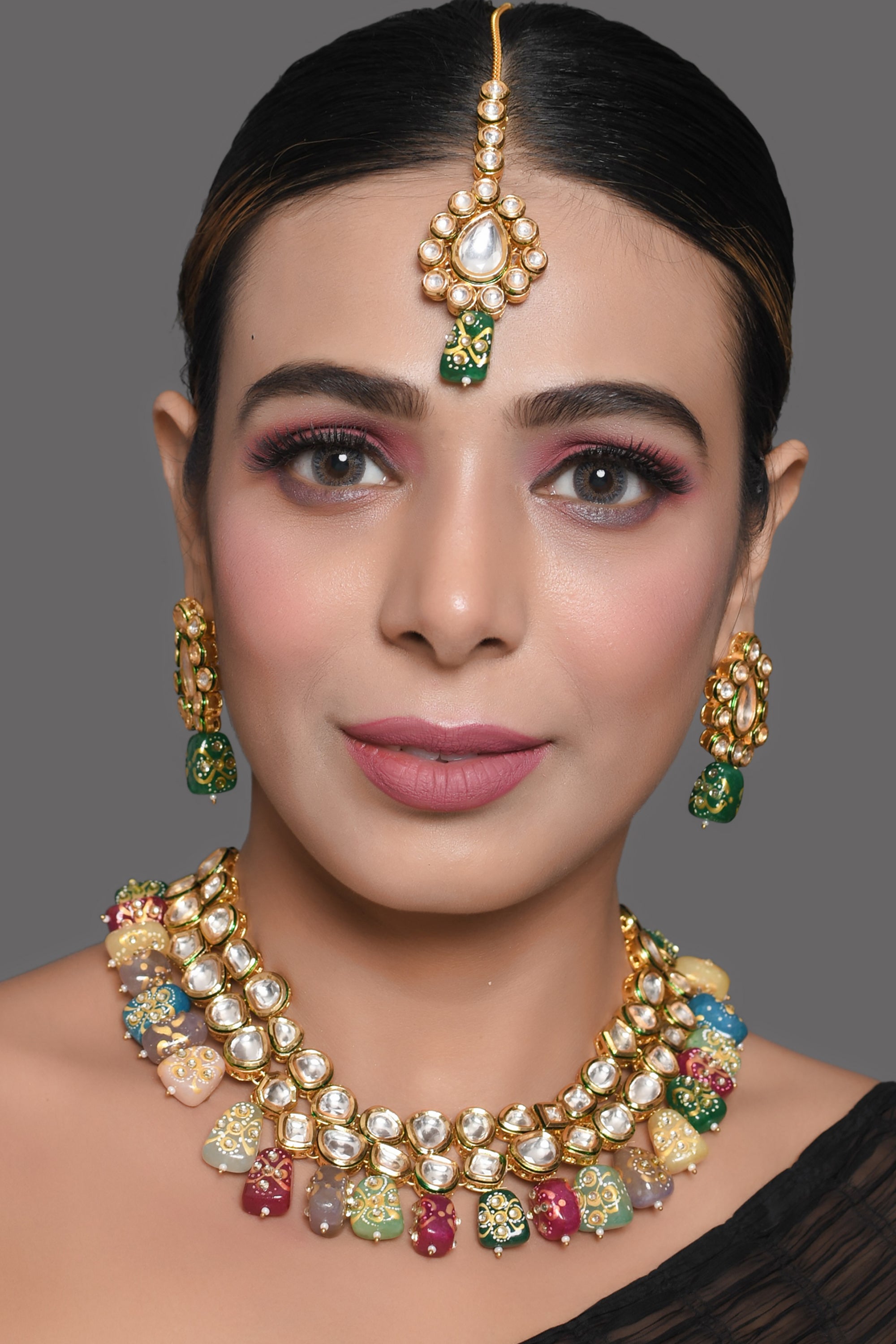 Women's Gold toned multicolored beaded kundan necklace teamed with matching earrings & mang tika - Femizen