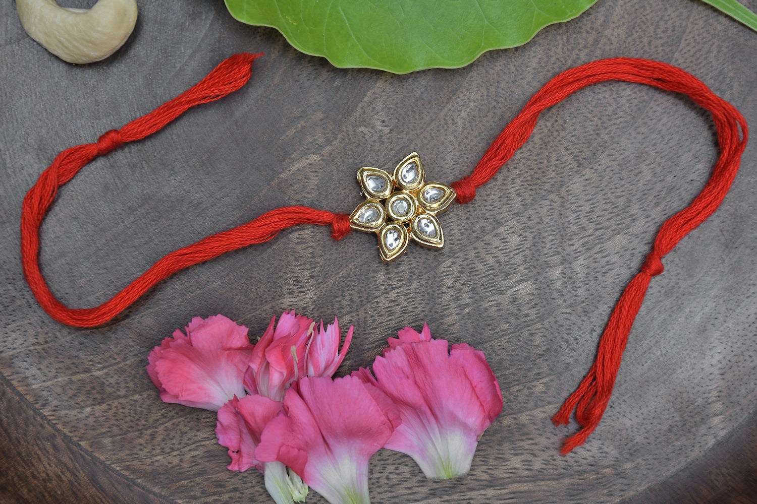 Kundan Floral Red Gold Tone Kundan Rakhi