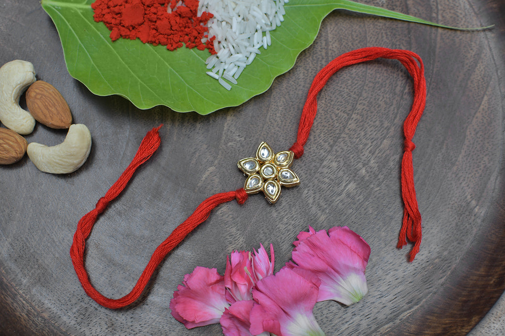 Kundan Floral Red Gold Tone Kundan Rakhi