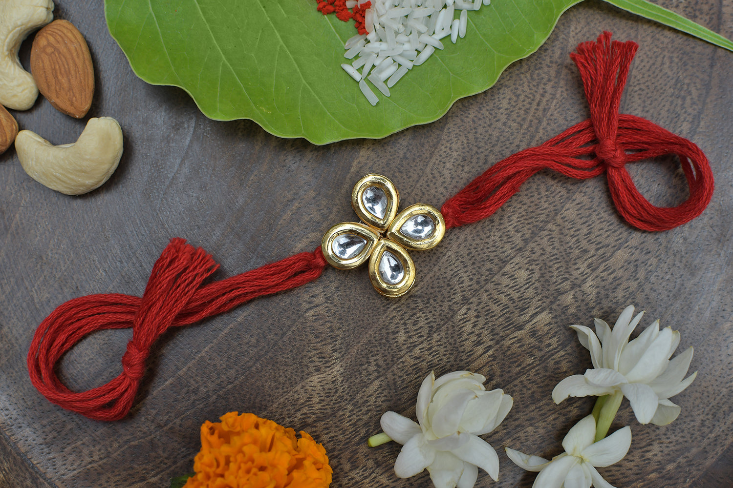 Kundan Floral Red Gold Tone Kundan Rakhi