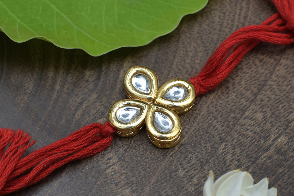 Kundan Floral Red Gold Tone Kundan Rakhi