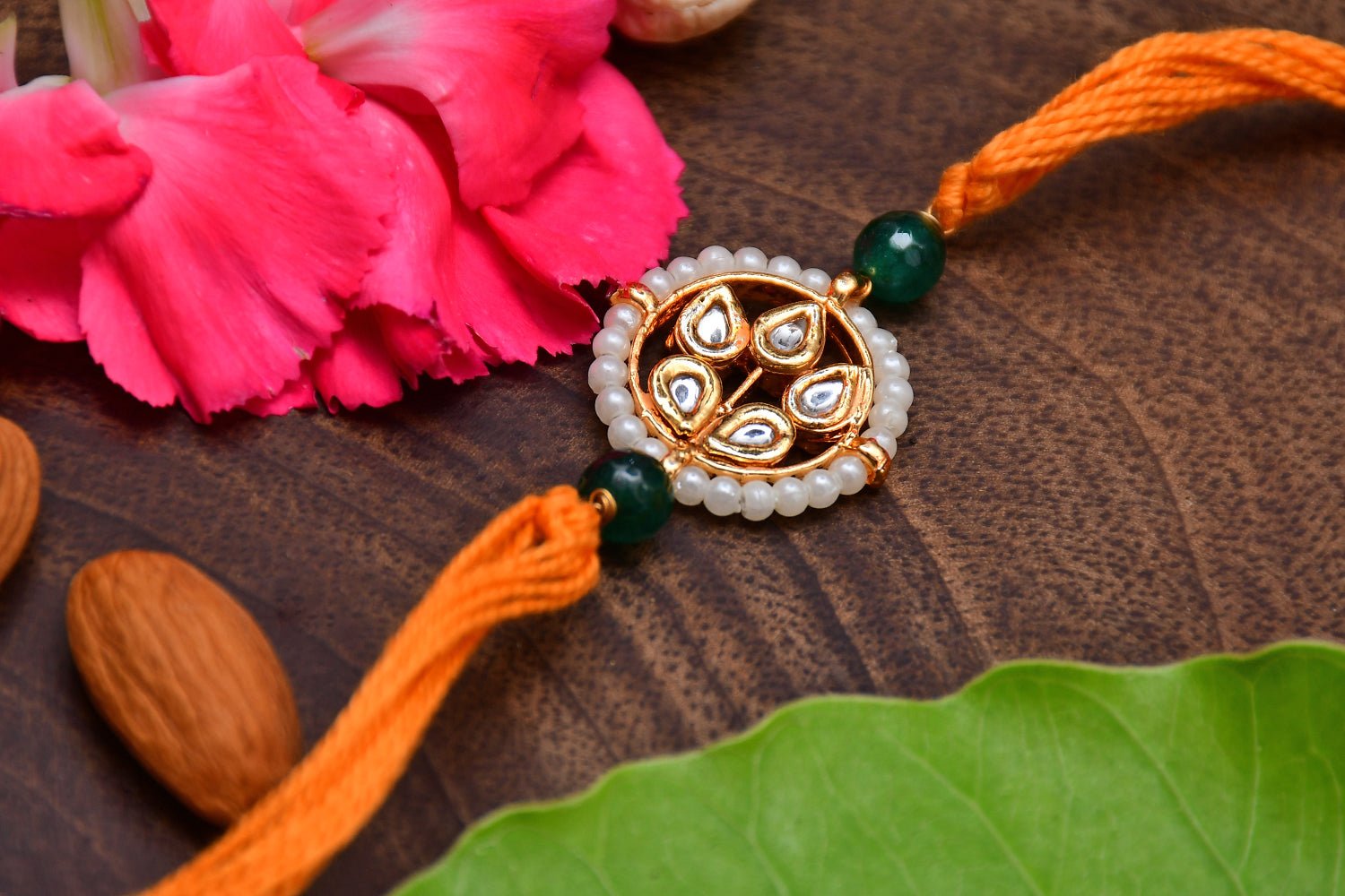 Kundan Floral Gold Tone Kundan Rakhi With Organish Yellow