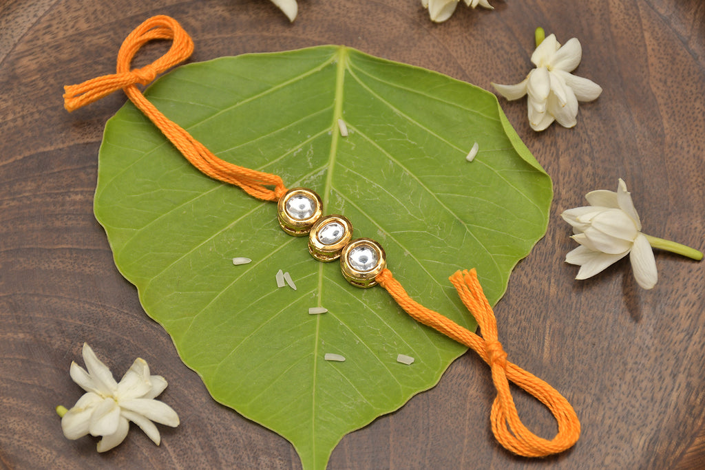 Yellow Orange Gold Tone Kundan Rakhi