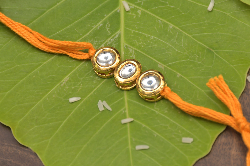 Yellow Orange Gold Tone Kundan Rakhi