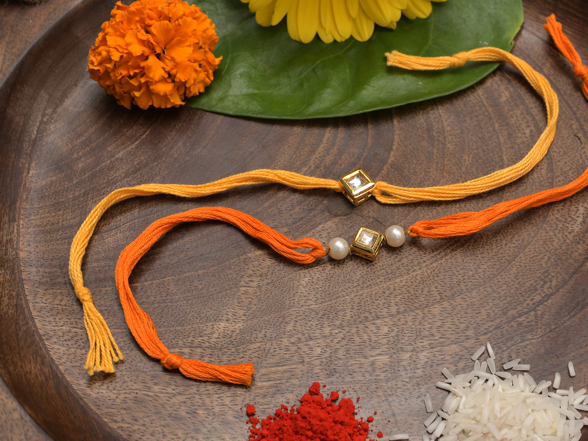 Kundan And Pearl Handmade Rakhi- Set Of 2