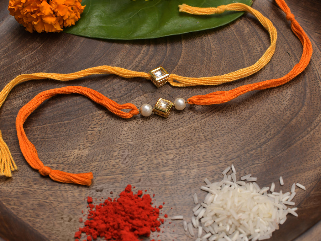 Kundan And Pearl Handmade Rakhi- Set Of 2