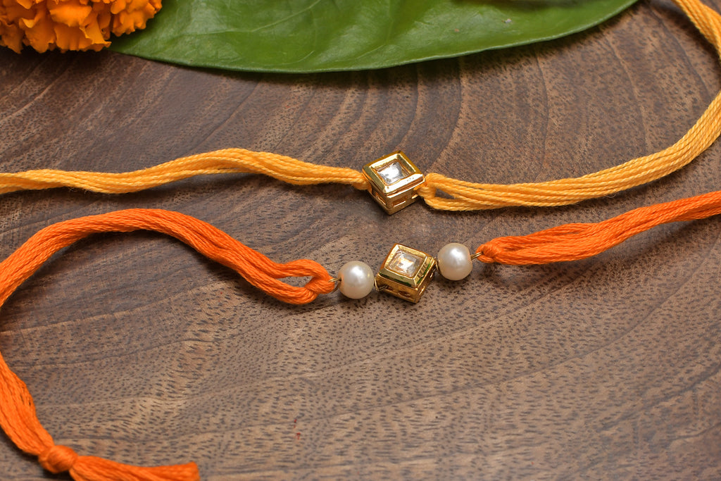 Kundan And Pearl Handmade Rakhi- Set Of 2