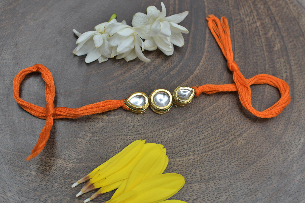 Orange Gold Tone Kundan Rakhi