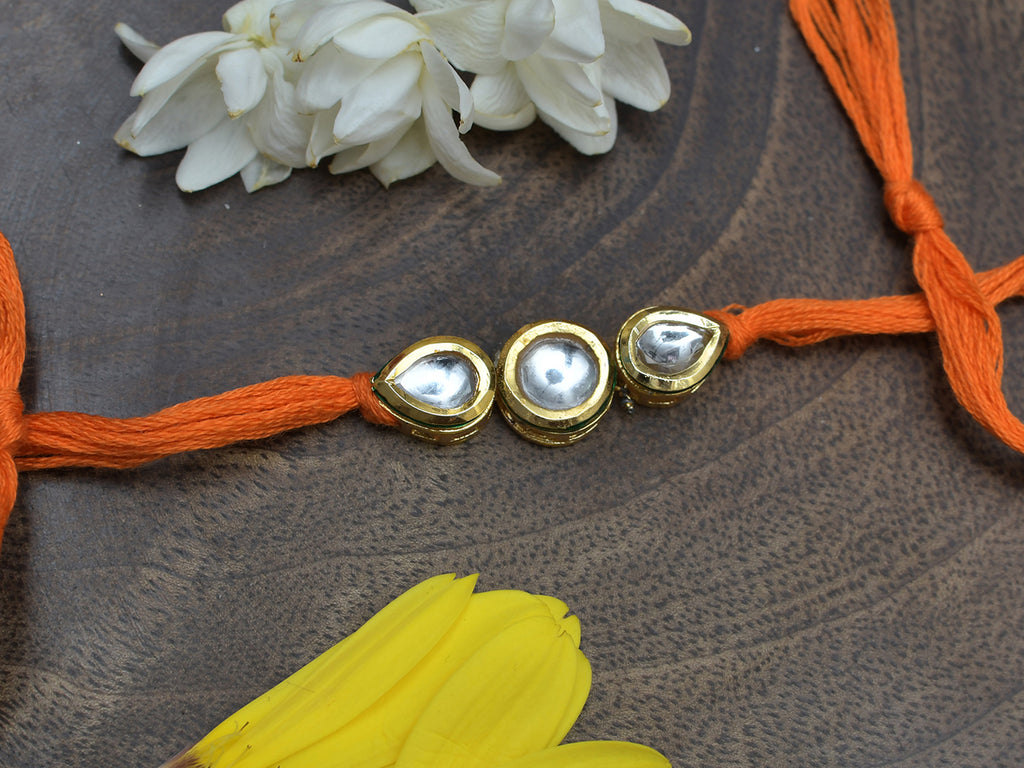 Orange Gold Tone Kundan Rakhi