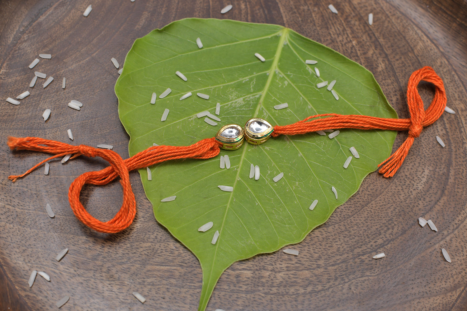 Orange Gold Tone Kundan Rakhi