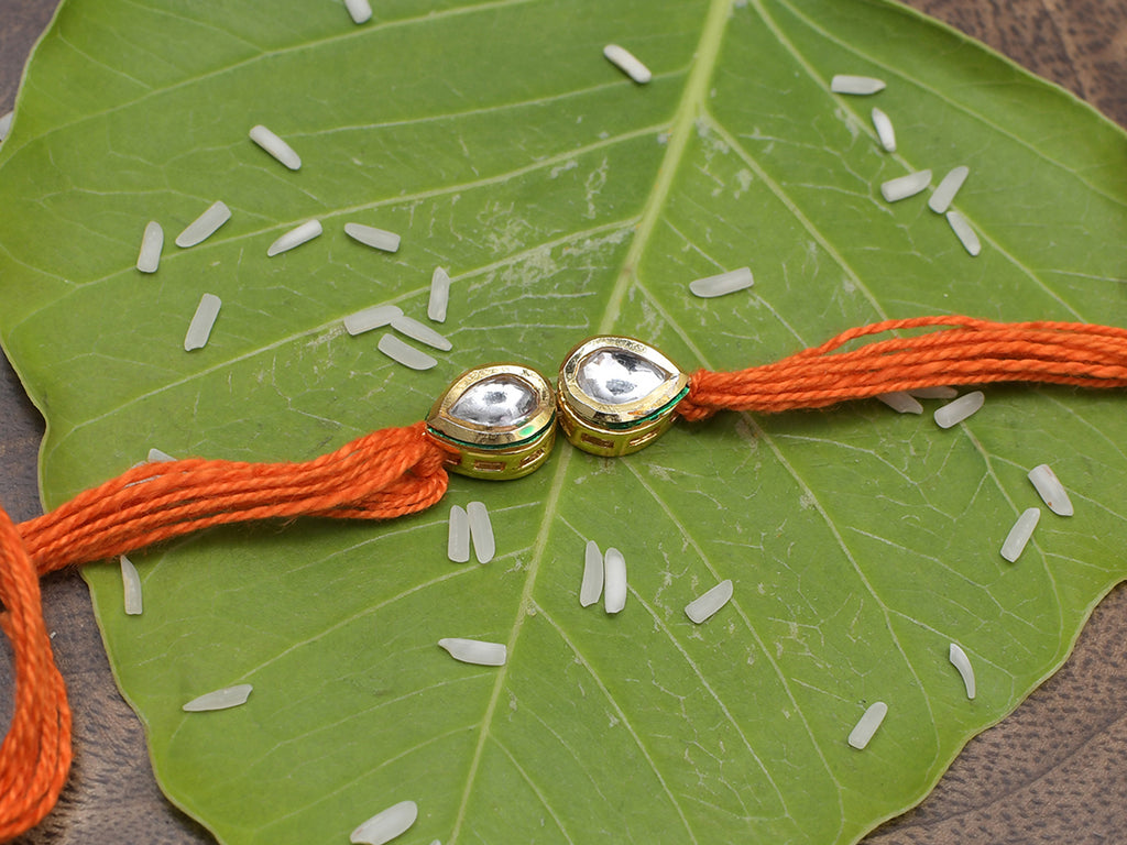 Orange Gold Tone Kundan Rakhi