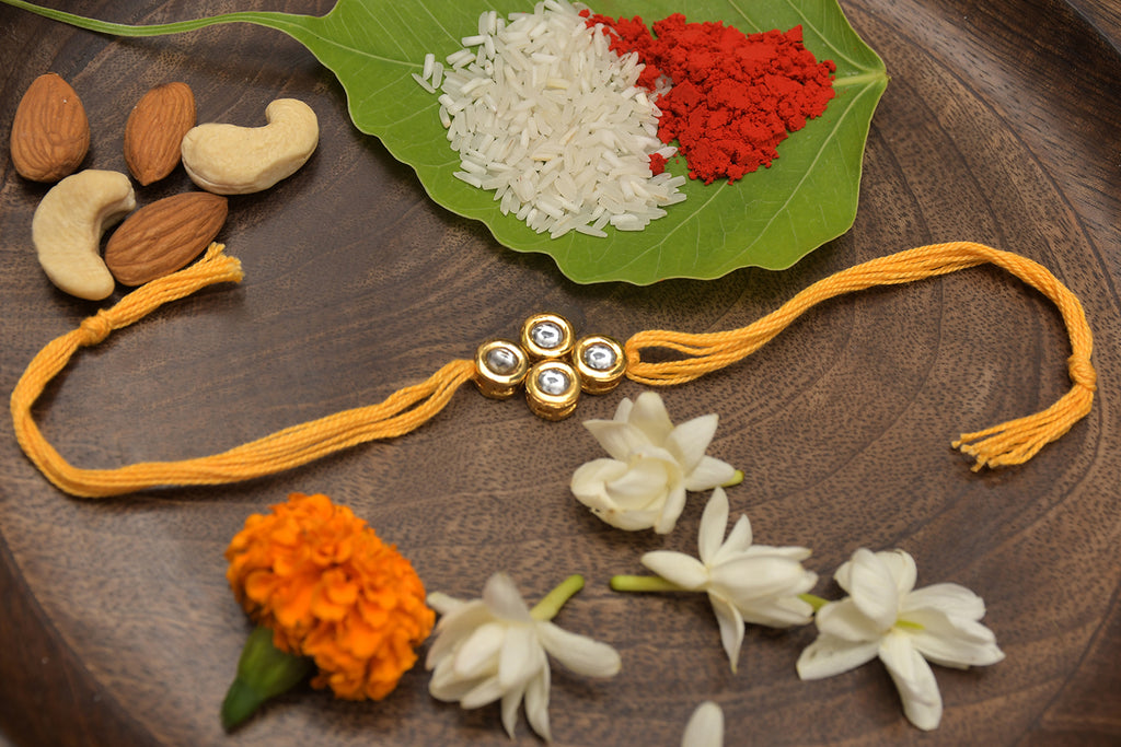 Yellow Gold Tone Kundan Rakhi