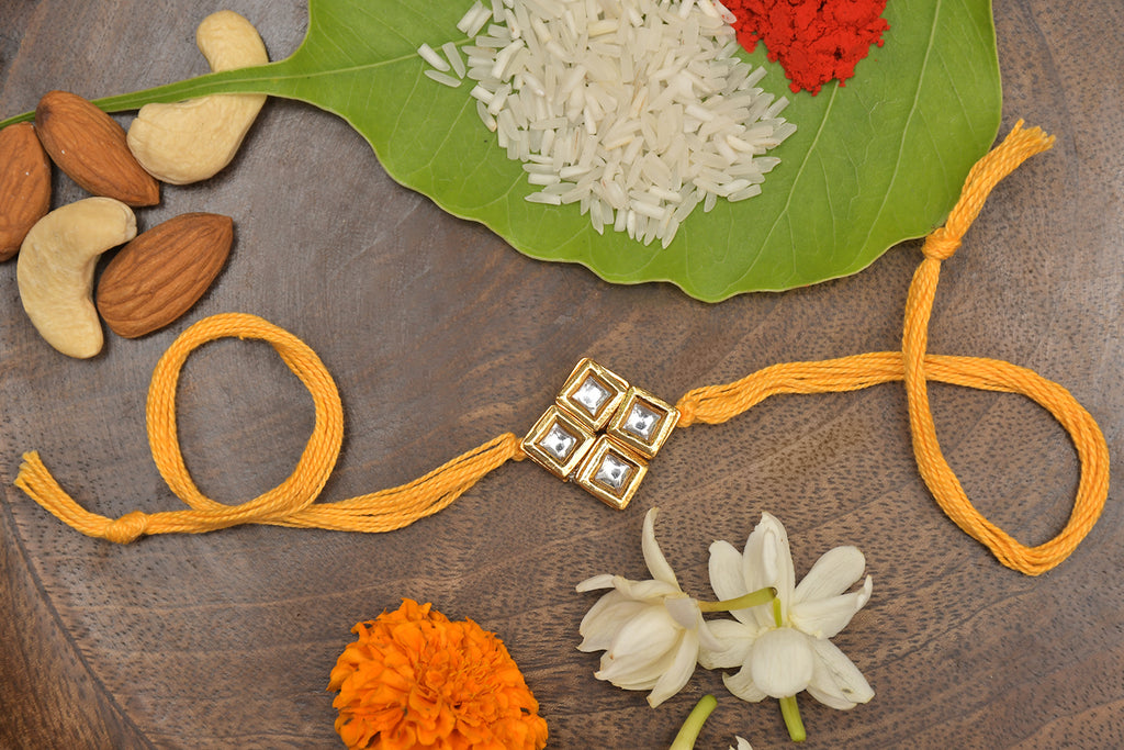 Yellow Gold Tone Kundan Rakhi