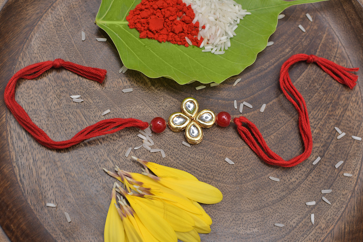 Kundan Floral Red Gold Tone Kundan Rakhi