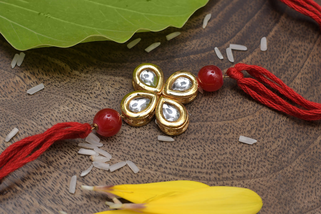Kundan Floral Red Gold Tone Kundan Rakhi