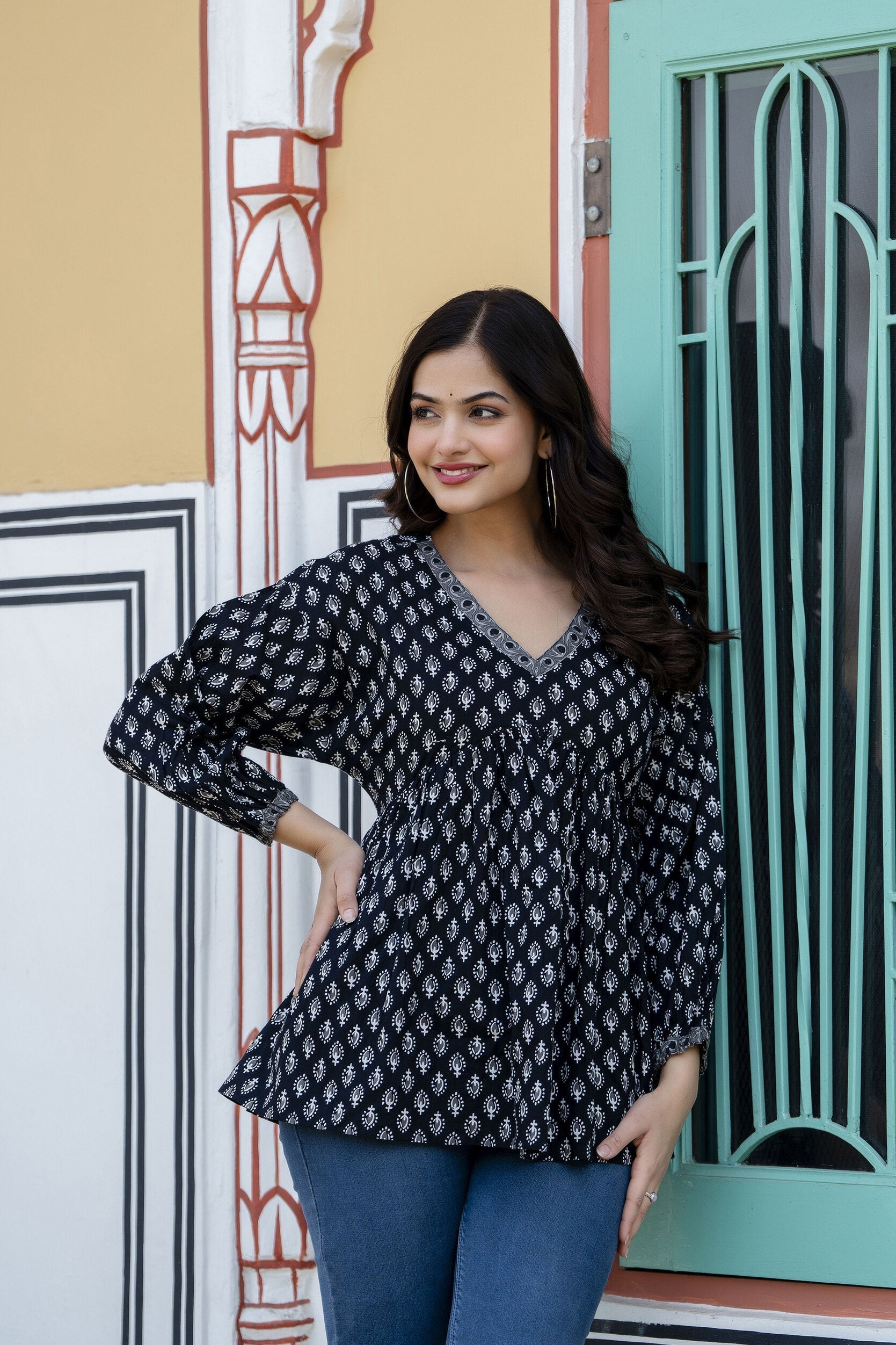 Women's Black Printed V-Neck Peplum Tunic