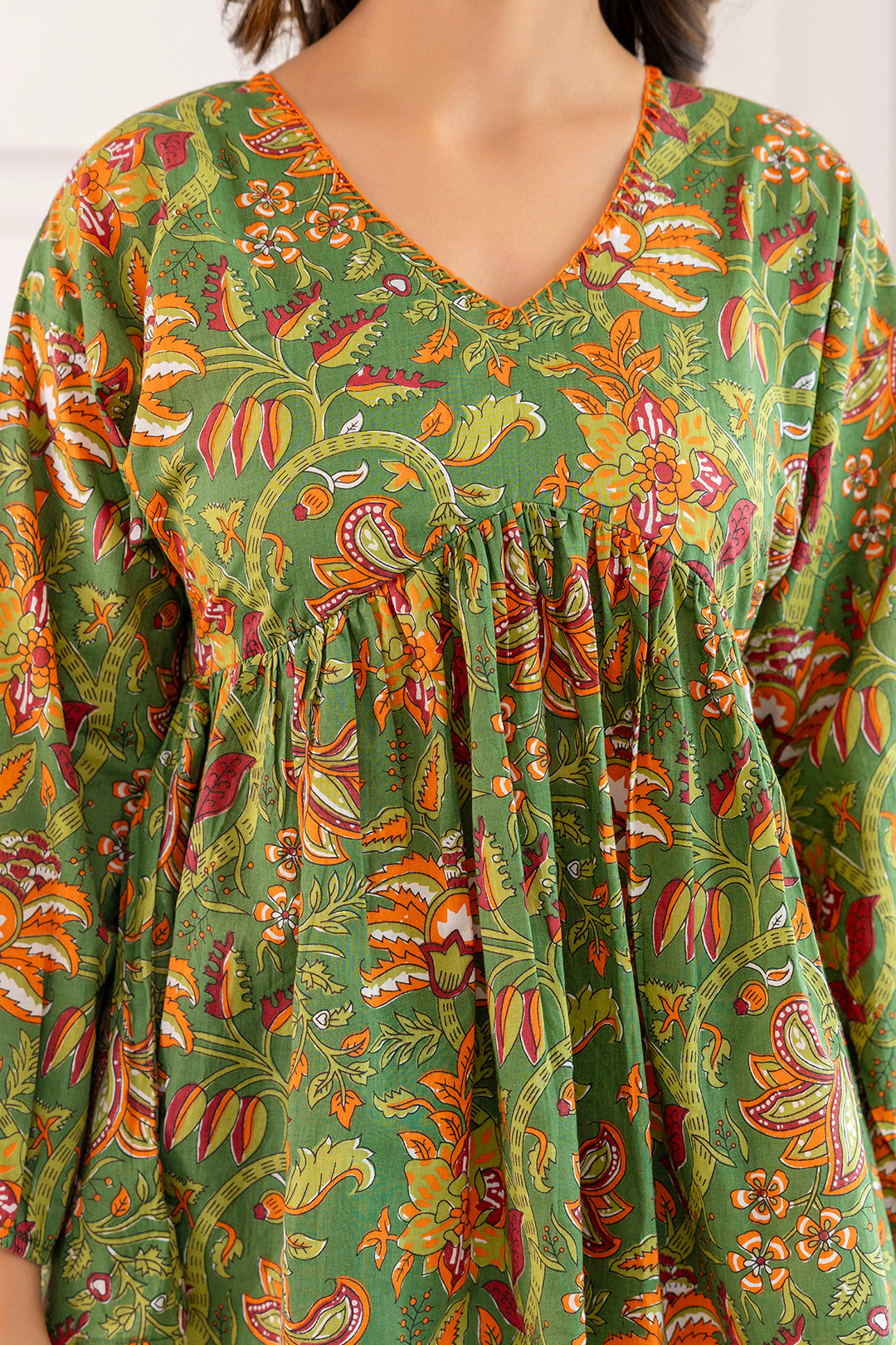 Women's Green Printed V-Neck Peplum Tunic - Taantav