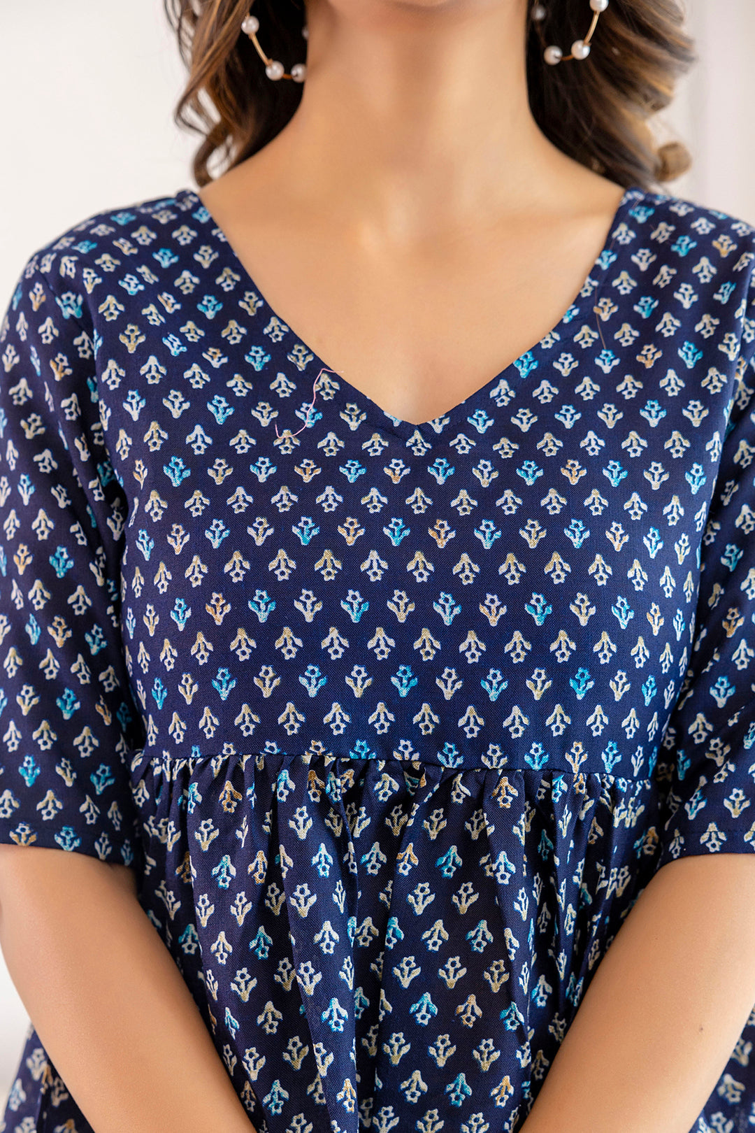 Women's Navy Blue Printed V-Neck Peplum Tunic - Taantav