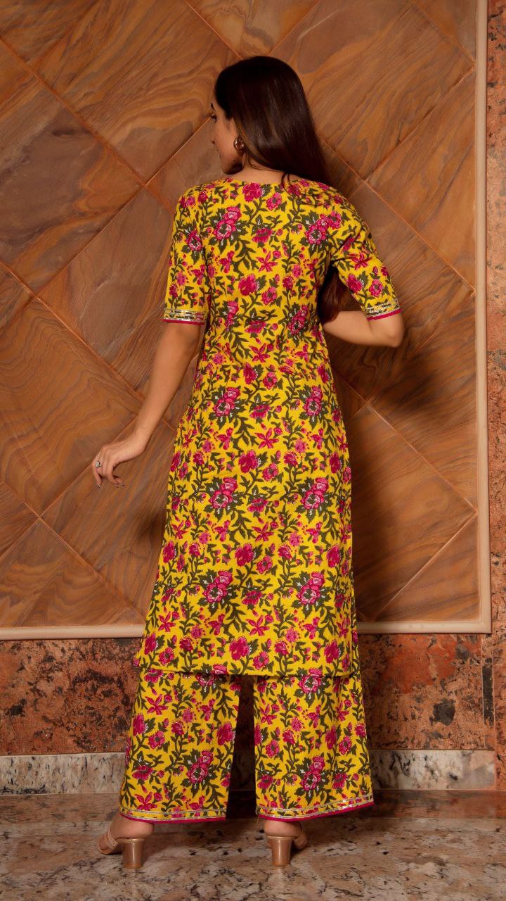 Women's Floral Printed Knee Length Elbow Length Sleeves Round Neck Kurti And Palazzo Set With Net Dupatta - Taantav