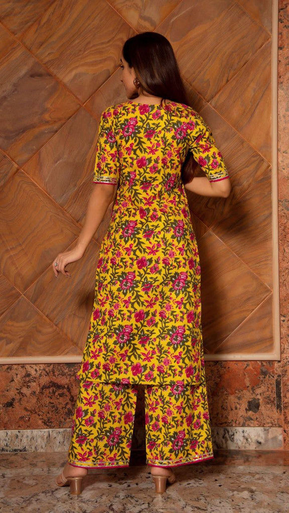Women's Floral Printed Knee Length Elbow Length Sleeves Round Neck Kurti And Palazzo Set With Net Dupatta