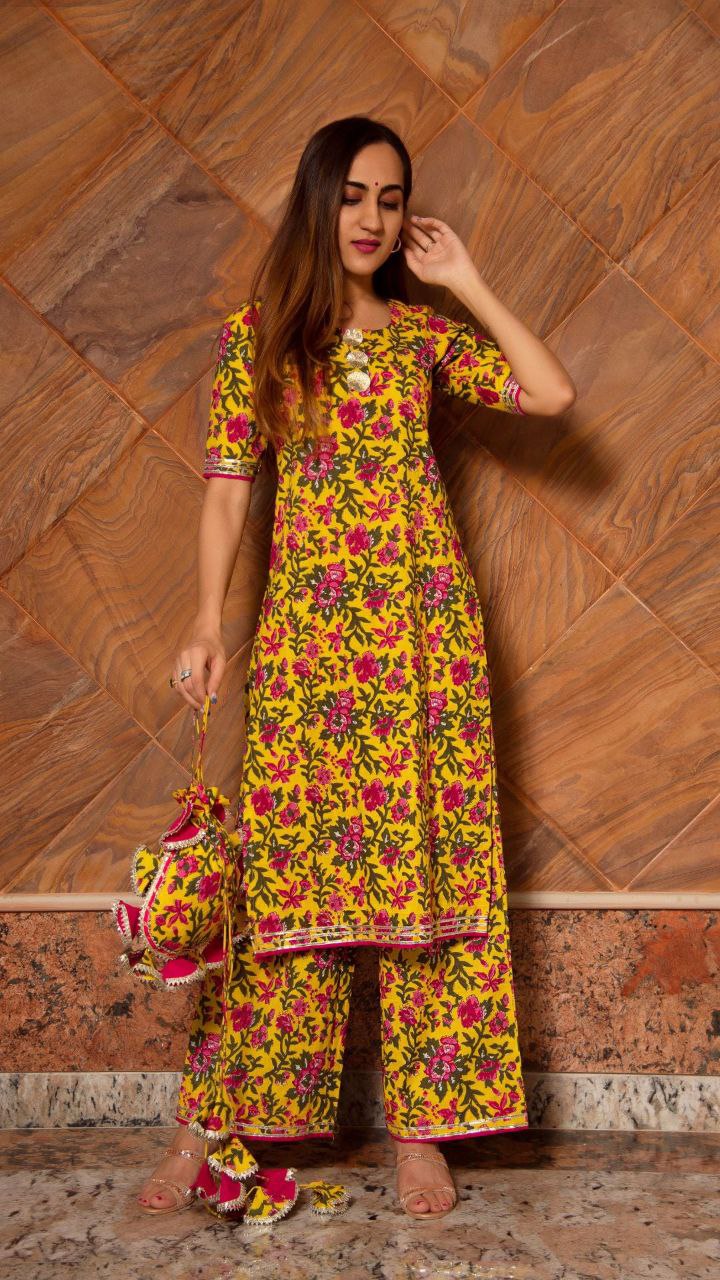 Women's Floral Printed Knee Length Elbow Length Sleeves Round Neck Kurti And Palazzo Set With Net Dupatta - Taantav