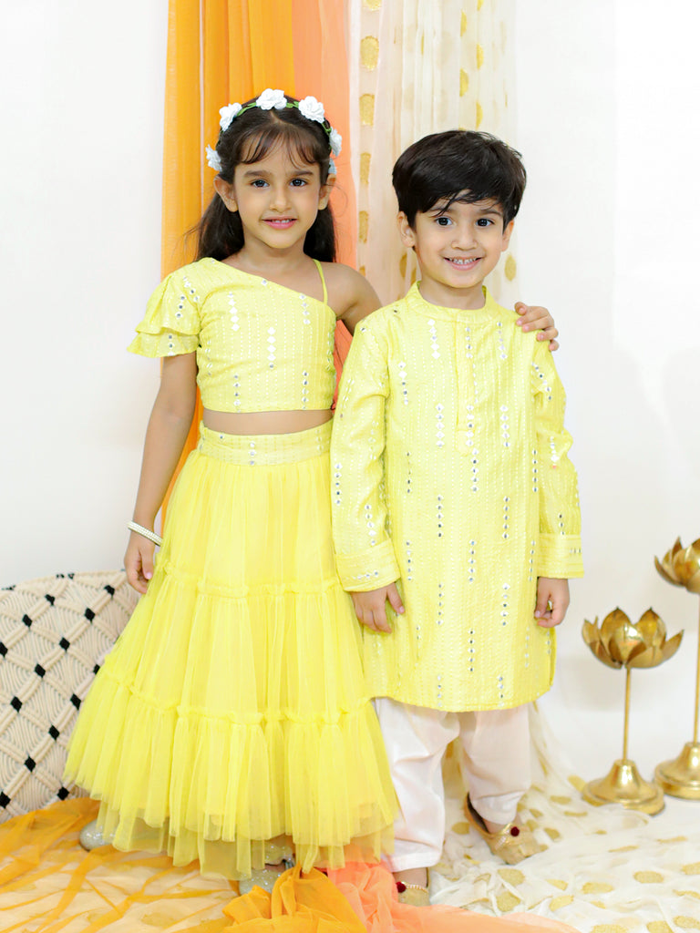 Girl's Off Shoulder Faux Mirror Choli With Tie Ups & Smocking At Back, Mesh Layered Flared Ghaghra With Faux Mirror Belt-Yellow