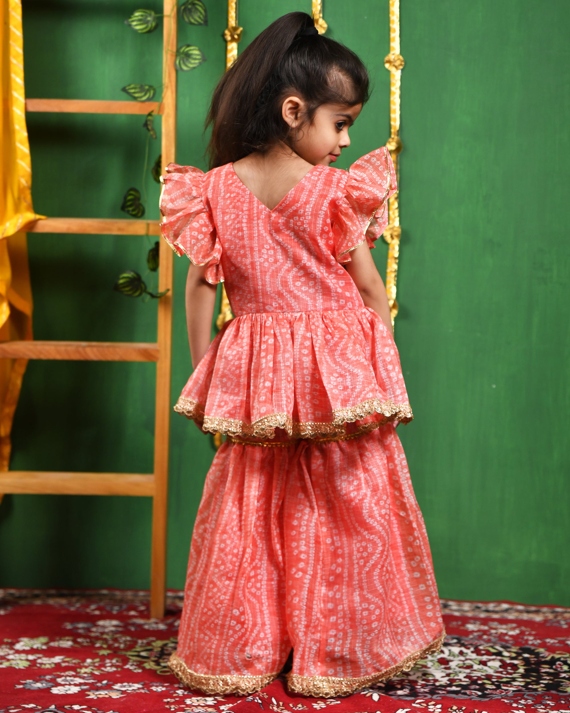 Girl's Peach Leheriya Printed Kurti With Lace Work Sharara Set - Rangpur