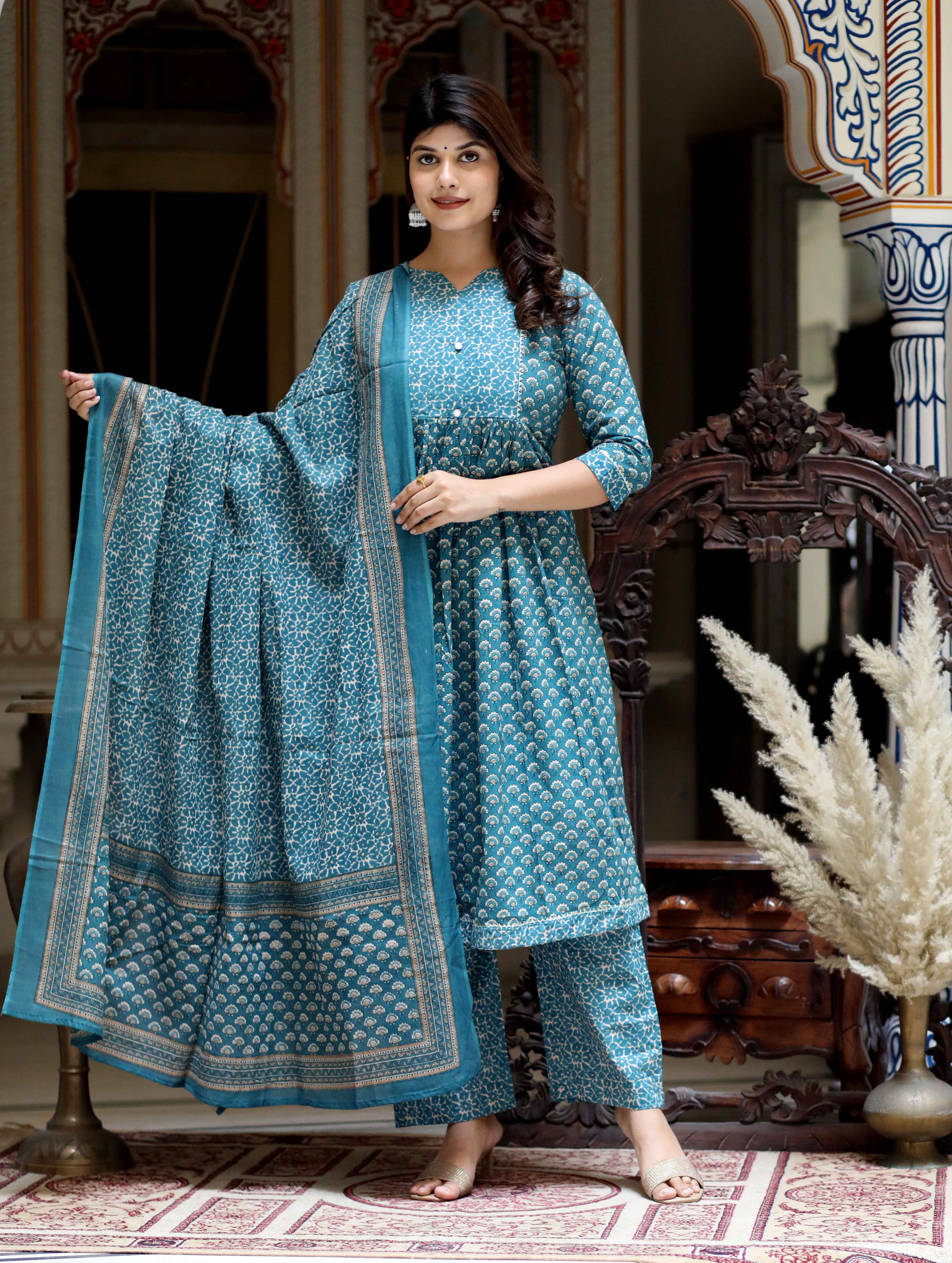 Women's Blue Printed Floral Nayra Cut Cotton Kurta & Palazzo With Dupatta Set
 - Doriyaan