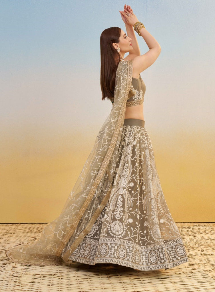 Women's Ivory Net Thread Embroiderey With All Over Sequins Work Lehenga Set
