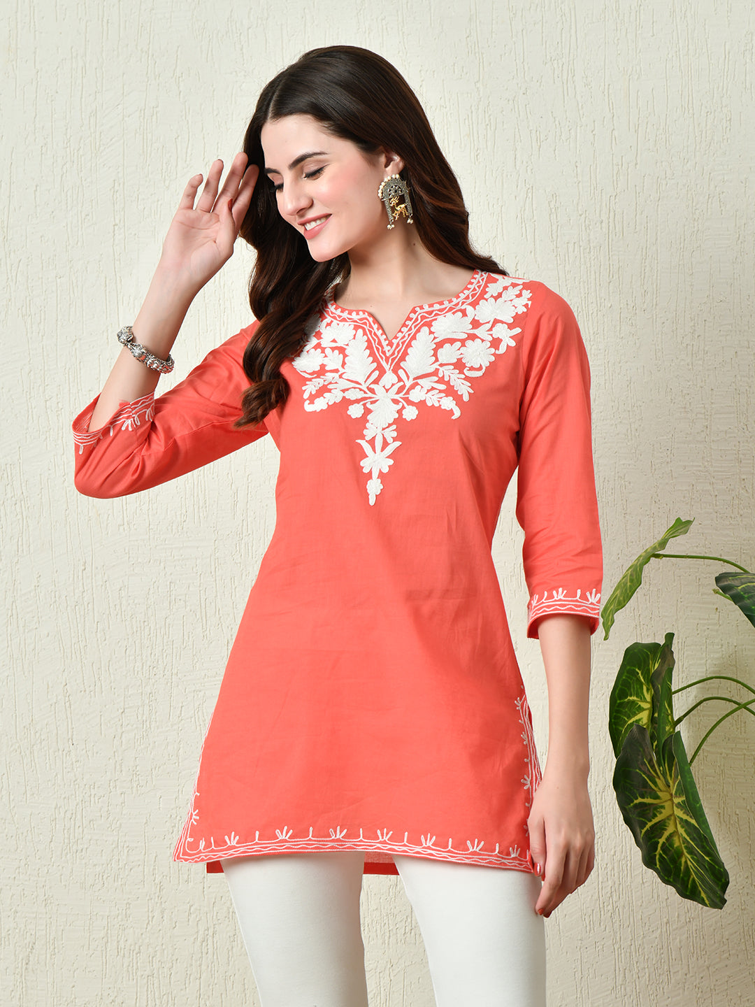 Women's Stylish Peach Cotton Short Kurti with Elegant Work - Taantav